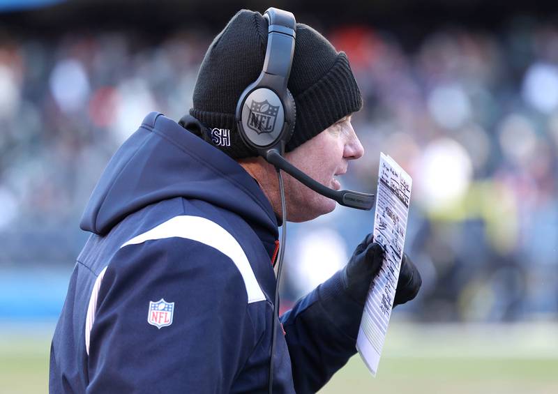 Chicago Bears head coach Matt Eberflus talks in his headset during their game against the Eagles Sunday, Dec. 18, 2022, at Soldier Field in Chicago.