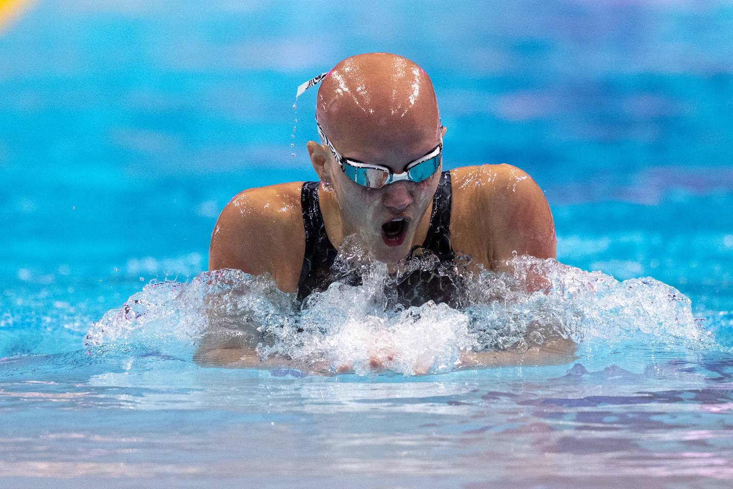 Leah Hayes competing in the first day of the FINA World Championships in Budapest, Hungary. Photo was taken by This photo of Hayes was taken by Mike Lewis/USA Swimming and the Chronicle was given permission to use the photo for publication.