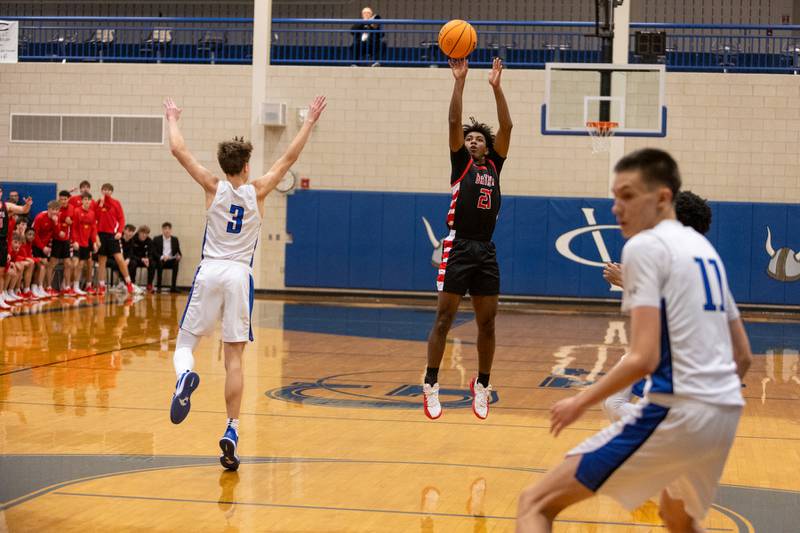 Batavia's Xavier Justice shoots a three pointer against Geneva on Friday, Dec.19,2025 in Geneva.