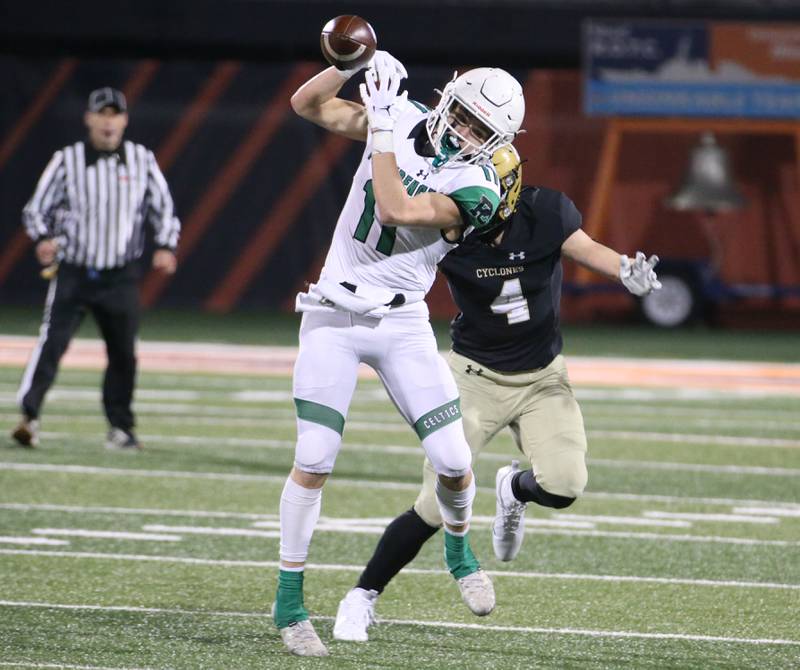 Providence Catholic quarterback Lucas Proudfoot takes his helmet off for the final time after loosing to Sacred Heart-Griffin in the Class 4A state title on Friday, Nov. 25, 2022 at Memorial Stadium in Champaign.