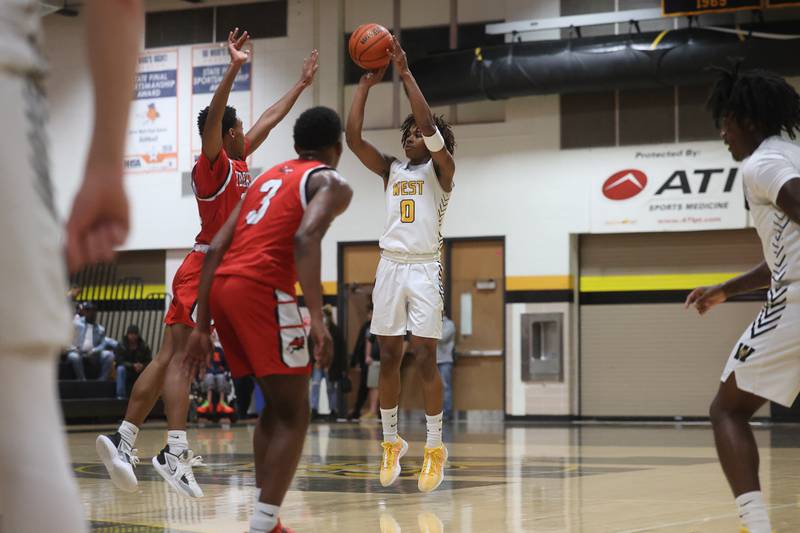 Joliet West’s Aamir Shannon puts up a shot against Yorkville on Friday, Jan. 5th, 2024. in Joliet.