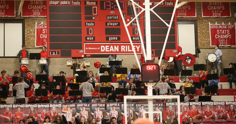 Members of the Ottawa High School band play before the game between Ottawa and L-P in Kingman Gymnasium on Friday, Feb. 10, 2023 at Ottawa High School.