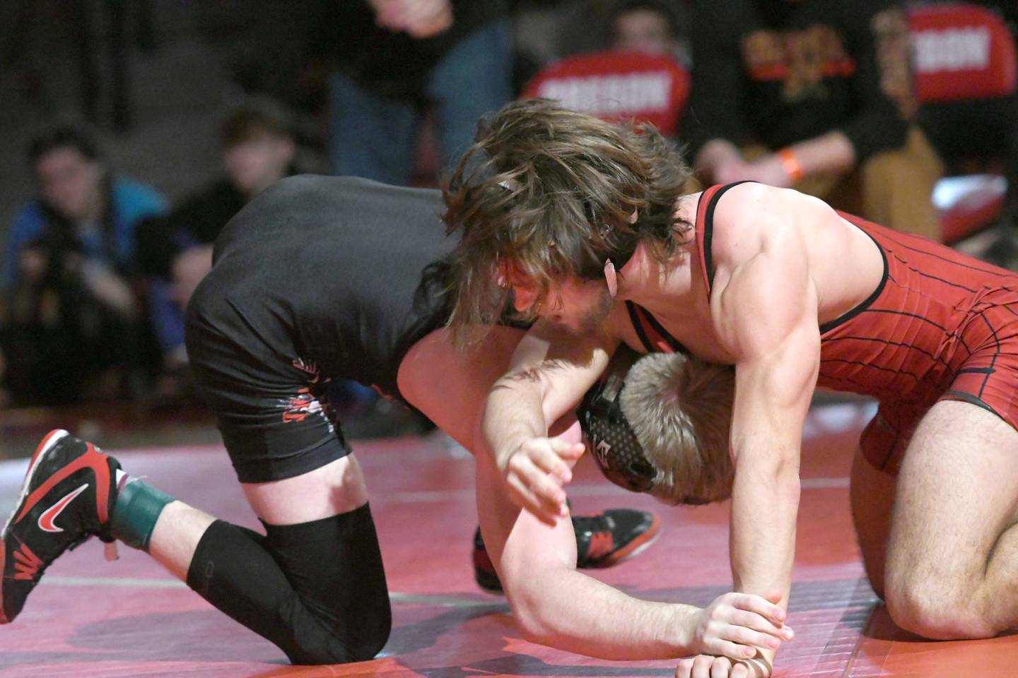 Erie's Jase Grunder battles Stillman Valley's  Jack Seacrist for third place at 152 pounds at the 1A Oregon Wrestling Sectional on Saturday. Seacrist won the match, but both wrestlers advance to the state finals.