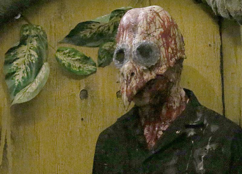 An actor poses for a photo at the Insanity Haunted House inside the Peru Mall on Thursday, Oct. 6, 2022. The haunted attraction is more than 10,000 square feet.