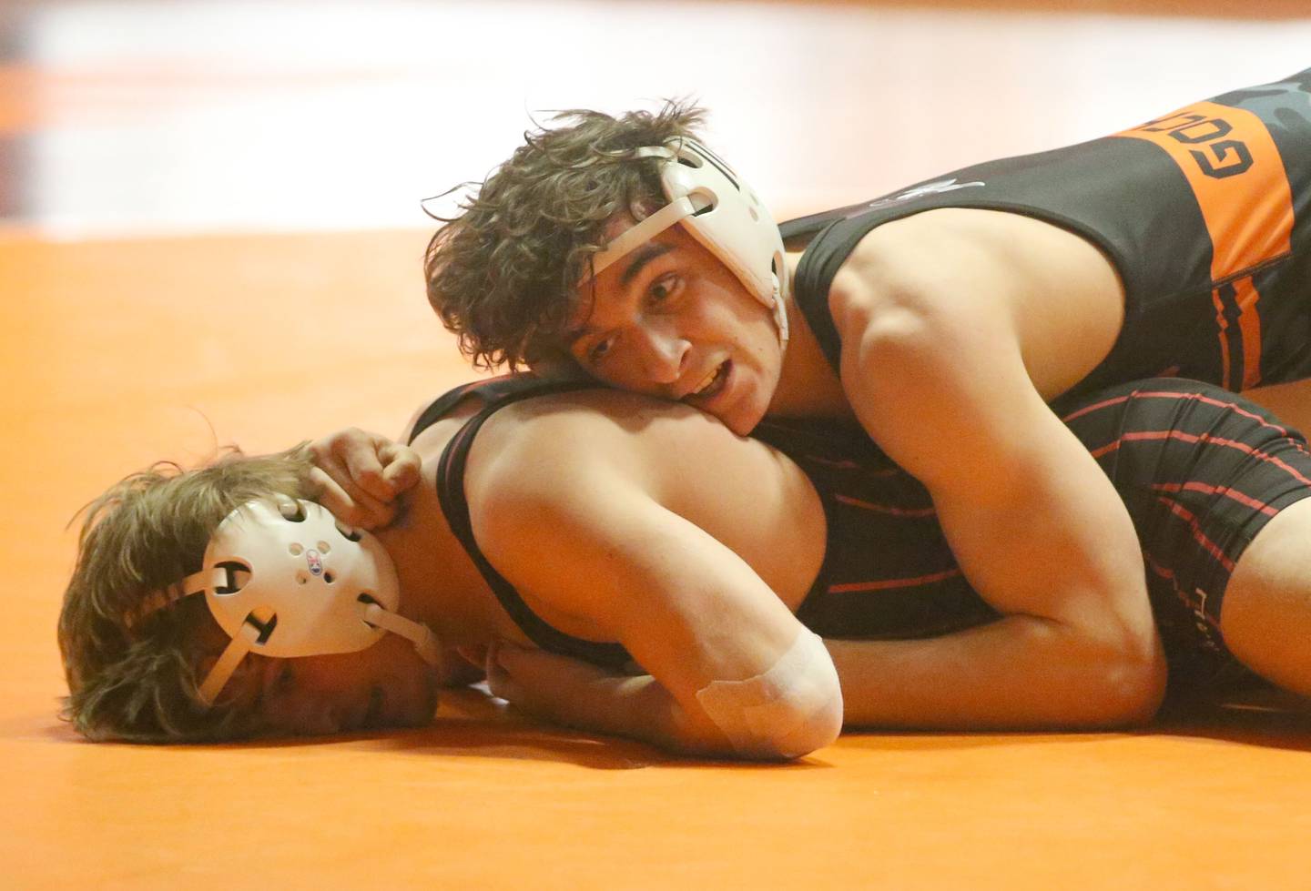 Kaneland's Alex Gochis wrestles Rockridge's Donald Cannon in the 138 weight class during the Class 2A Sectional championship on Saturday, Feb. 15, 2025 at Washington High School.
