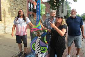 Joliet unveils summer guitar art