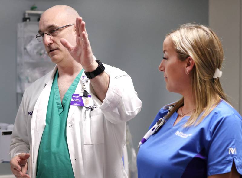 Dr. Gregory Conrad along with nurse Randa Melms talk in the emergency room Thursday, April, 18, 2024, at Northwestern Medicine Kishwaukee Hospital in DeKalb.