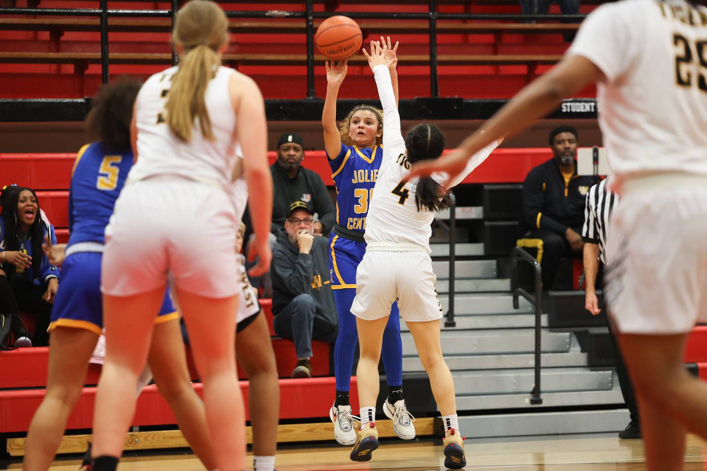 Joliet Central’s Nevaeh Wright puts up a contested shot against the Joliet West defense Monday, February 13, 2023.