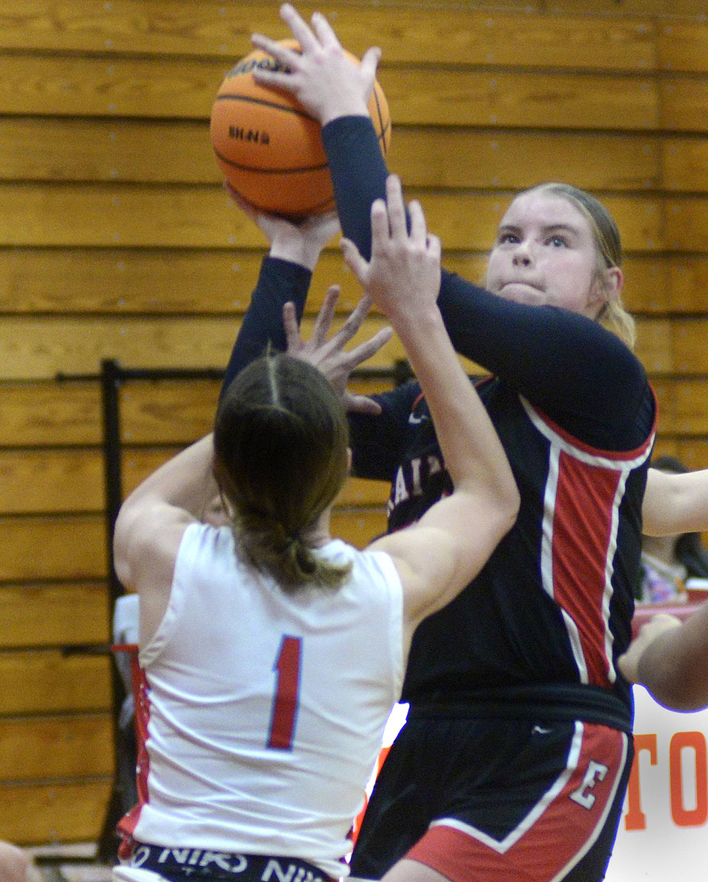 Earlville’s Audrey Scherer elevates to shoot while Streator's Rhea Huey (1) defends Saturday, Jan. 10, 2026, in Streator.