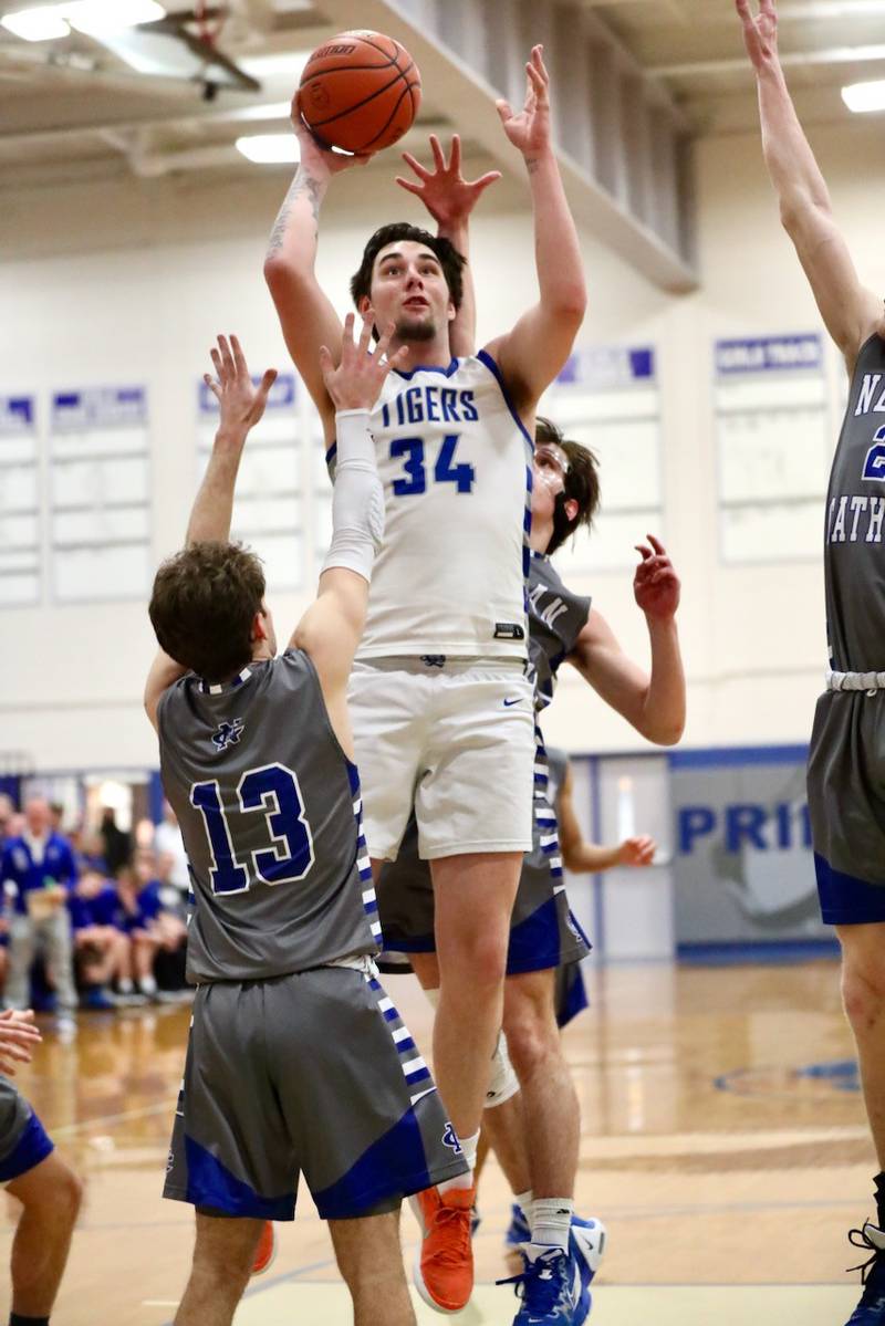 Princeton's Kolten Monroe shoots against Newman Friday night at Prouty Gym.