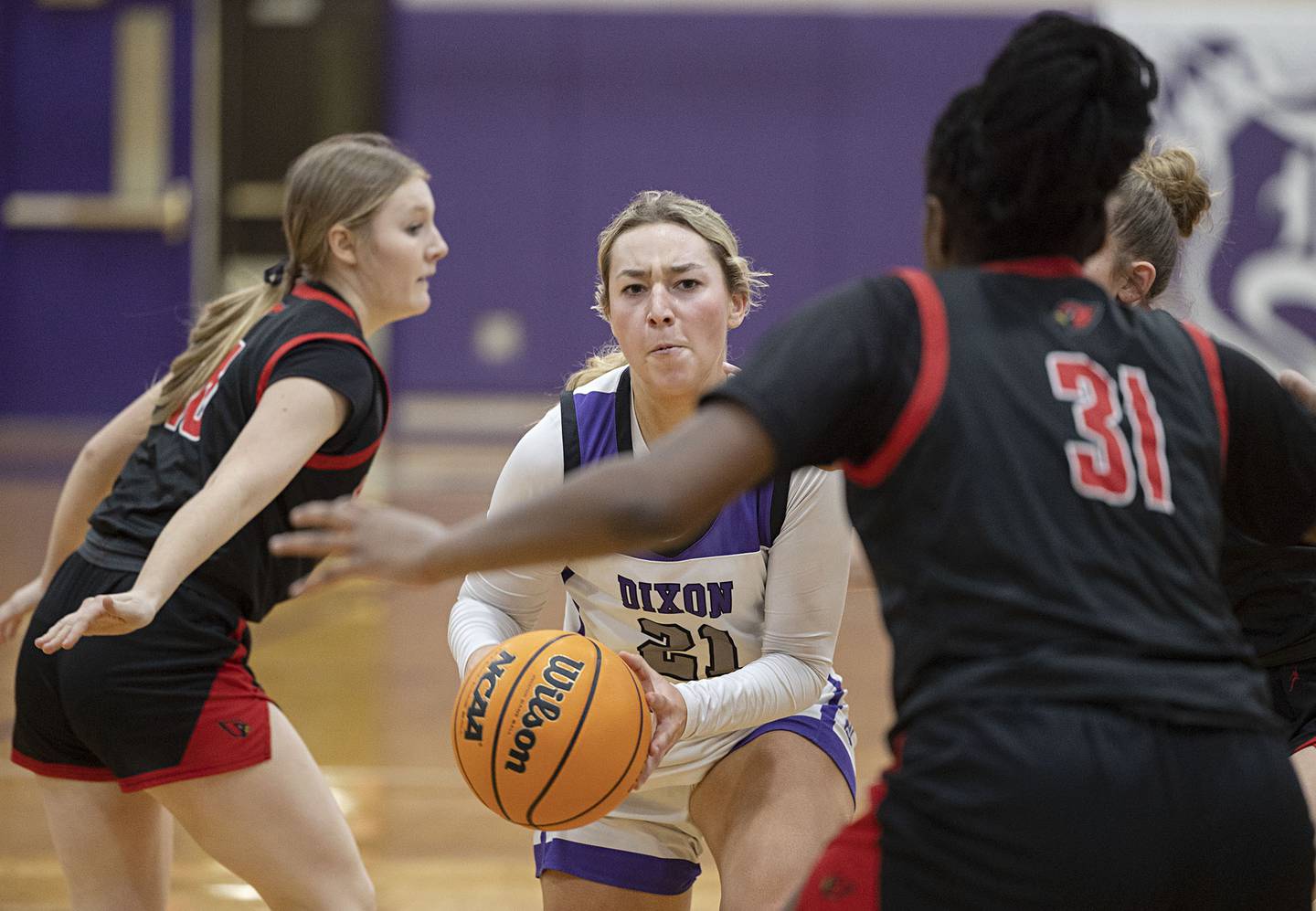 Dixon’s Reese Dambman handles the ball in traffic against Stillman Valley Saturday, Feb. 7, 2026.