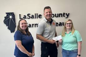 Farm Bureau donates $1K to Ottawa Fire Department for rescue equipment