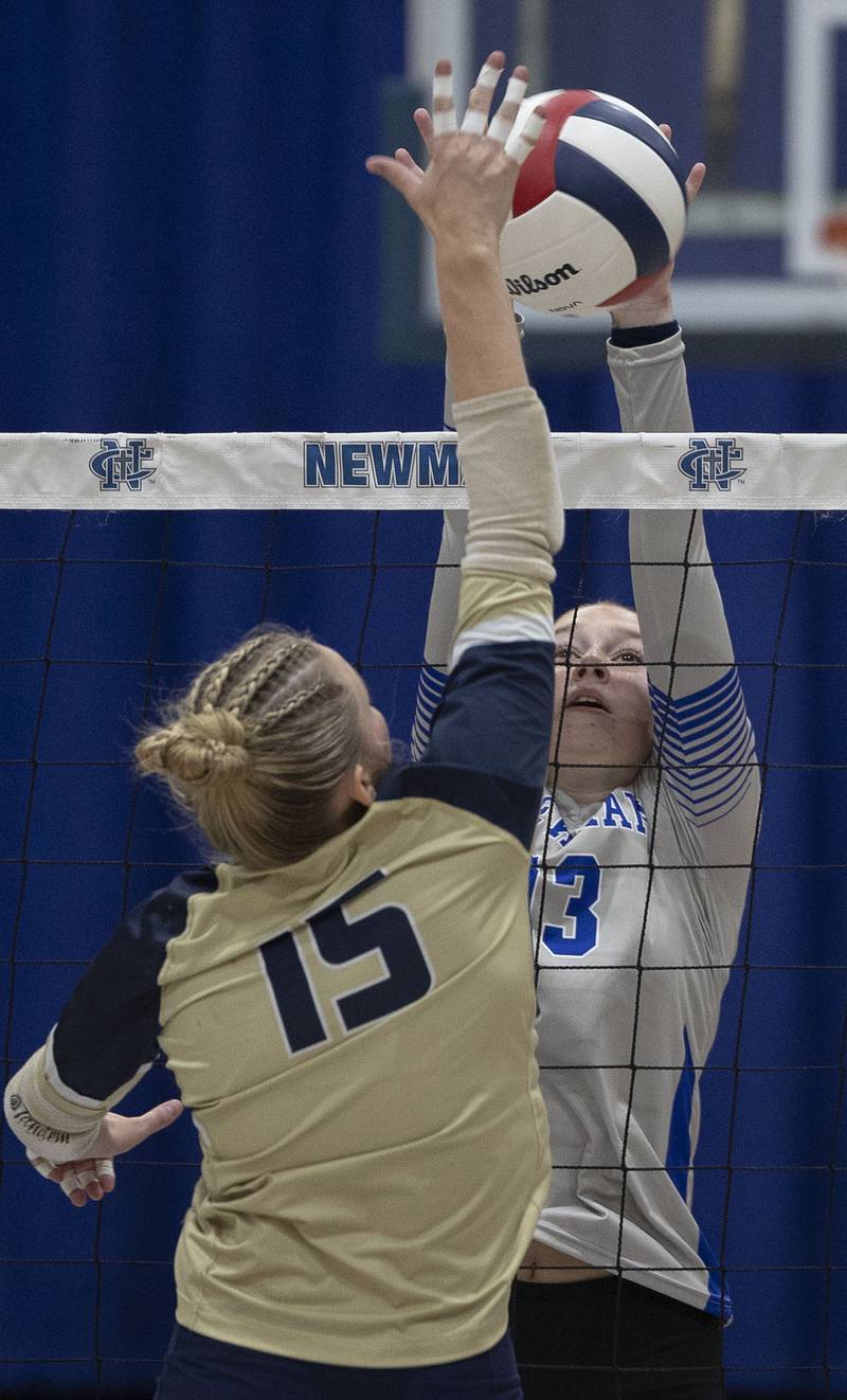 Newman’s Kennedi Shippert works to block a shot against Mercer County’s Rylee Bigham Wednesday, Sept. 24, 2025.