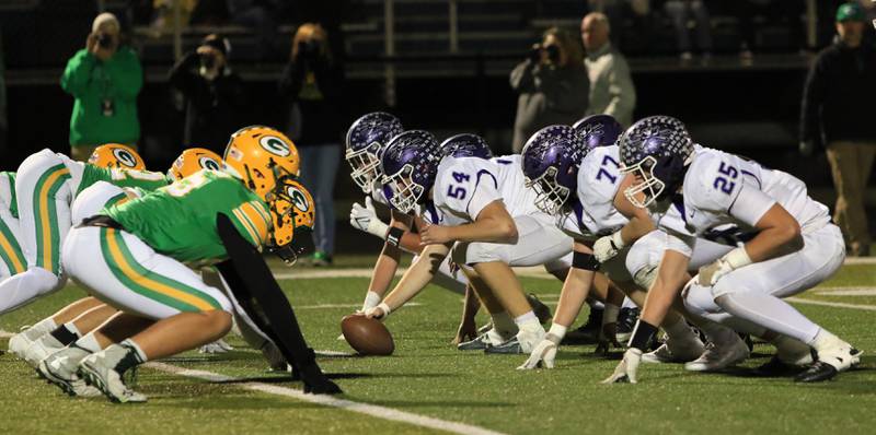 Rochelle prepares to snap the ball during Friday's game at Geneseo.
