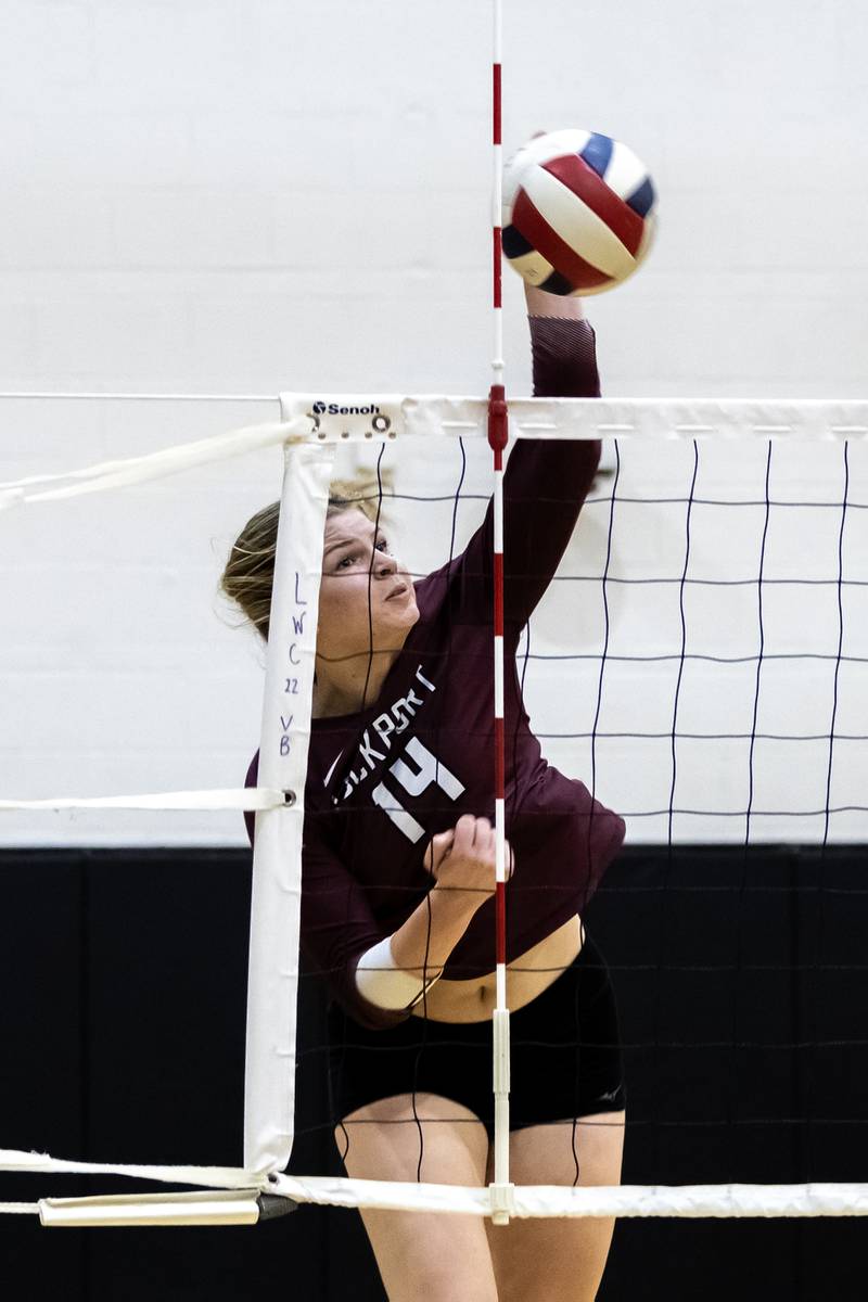 Lockport's Hutsyn Timosciek goes for a kill during a varsity volleyball game against Lincoln-Way Central at Lincoln-Way Central on Oct. 9, 2025.