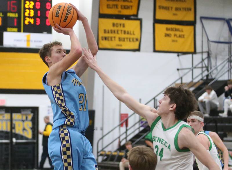 Marquette's Lucas Craig shoots a jump shot over Seneca's Patrick Griffin during the Tri-County Conference championship on Friday, Jan. 31, 2025 at Putnam County High School.
