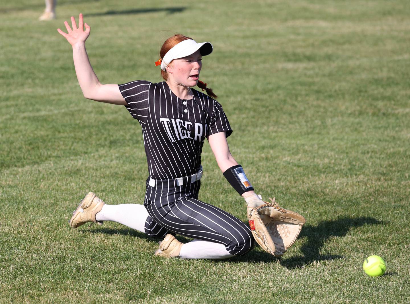 Crystal Lake Central's Makayla Malone tries to make a sliding catch Friday, June 6, 2025, during their Class 3A sectional final game against Prairie Ridge at Sycamore High School.