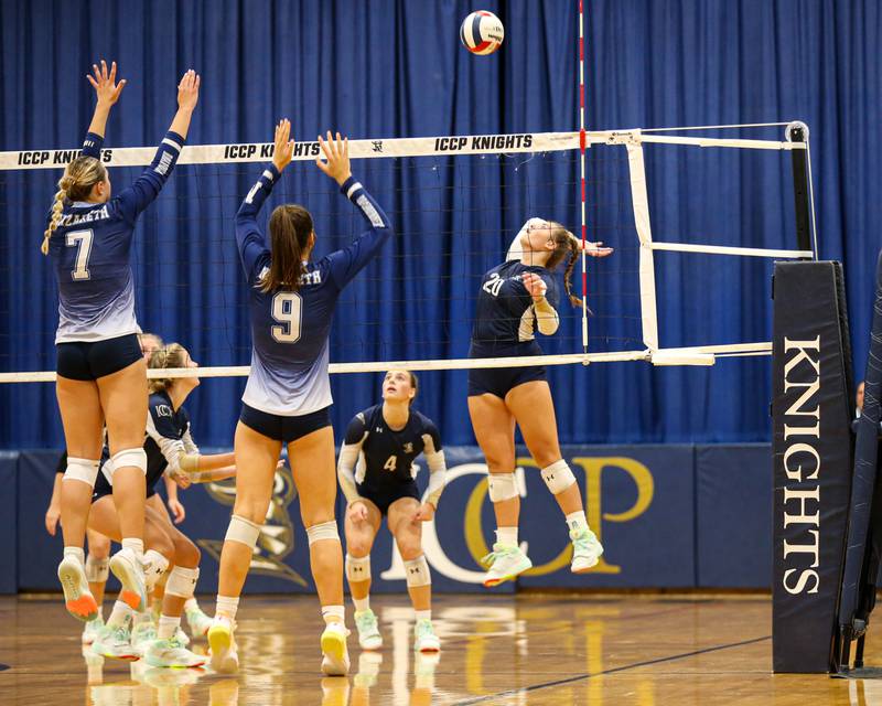 IC Catholic Prep's Emily Carling (20) spikes the ball during volleyball match between Nazareth at IC Catholic Prep.  Aug 29, 2023.