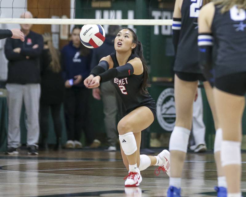 Benet's Abigail Lee (2) digs out a ball during Class 4A Glenbard West Sectional final volleyball match between St Charles North at Benet. Nov 6, 2025 in Glen Ellyn.