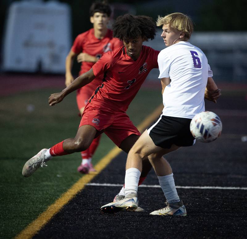 Bradley-Bourbonnais' Josh Jones, left, plays the ball around Manteno's Jake Krisko in a game on Tuesday, September 16, 2025.