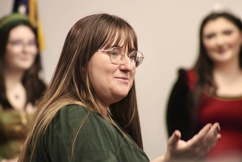 Erin Rogers, director of choral activities at Dixon High School, introduces members of the madrigal dinner cast that will perform 6:30 p.m. Friday at the school cafeteria. During the presentation to the board of education during Wednesday's meeting, board Vice President Rachel Cocar commended Rogers for helping make the music department a safe and welcoming environment for students.