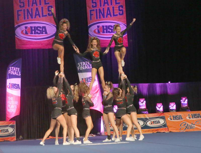 Members of the Crystal Lake Central cheerleading team perform at the Competitive Cheerleading State Final Competition on Saturday, Feb. 3, 2024 at Grossinger Motors Arena in Bloomington.