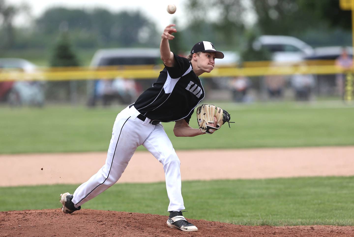 Kaneland's Logan Kottmeyer throws a pitch Saturday, June 4, 2022, during their IHSA Class 3A Sectional final game against Sycamore at the Sycamore Community Sports Complex.