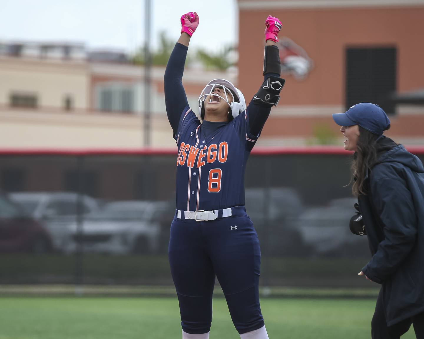 Oswego's Ahlivia East (8) celebrates her RBI during softball game between Oswego at Yorkville. May 5, 2026 in Yorkville.