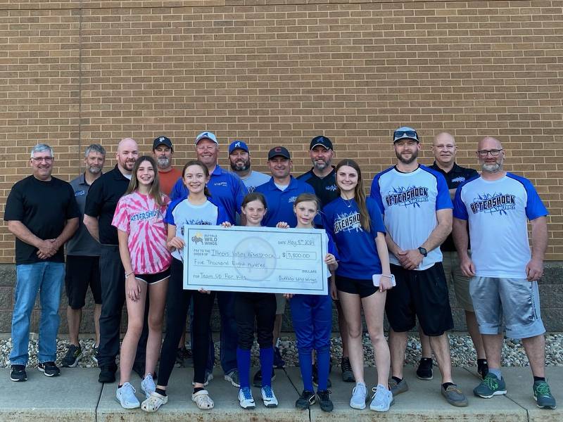 Peru Buffalo Wild Wings presented $5,800 to the Illinois Valley Aftershock Softball league and hosted a Eat Wings Raise Funds for Aftershock event Wednesday night.