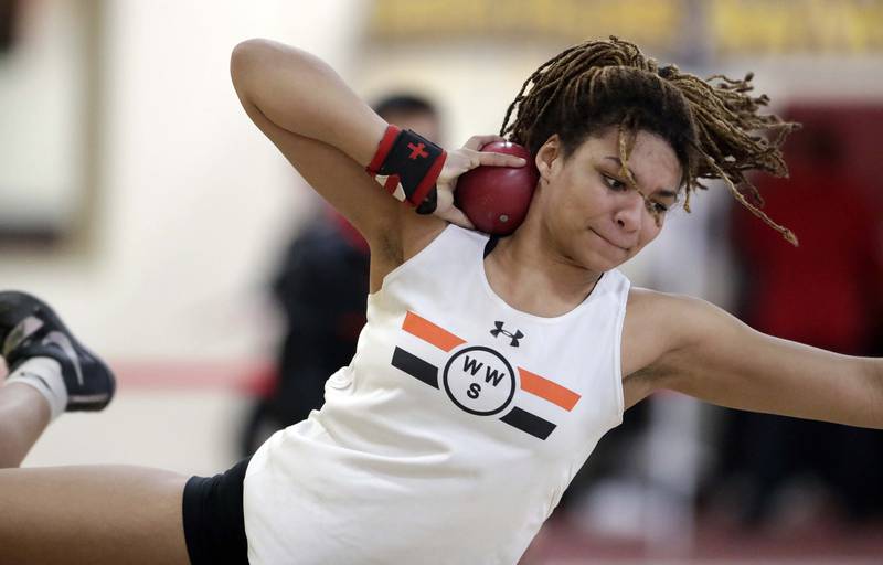 Wheaton Warrenville South’s Maya Kalombo competes in the shot put during the DuKane Girls Indoor Championship track meet Friday March 18, 2022 in Batavia.