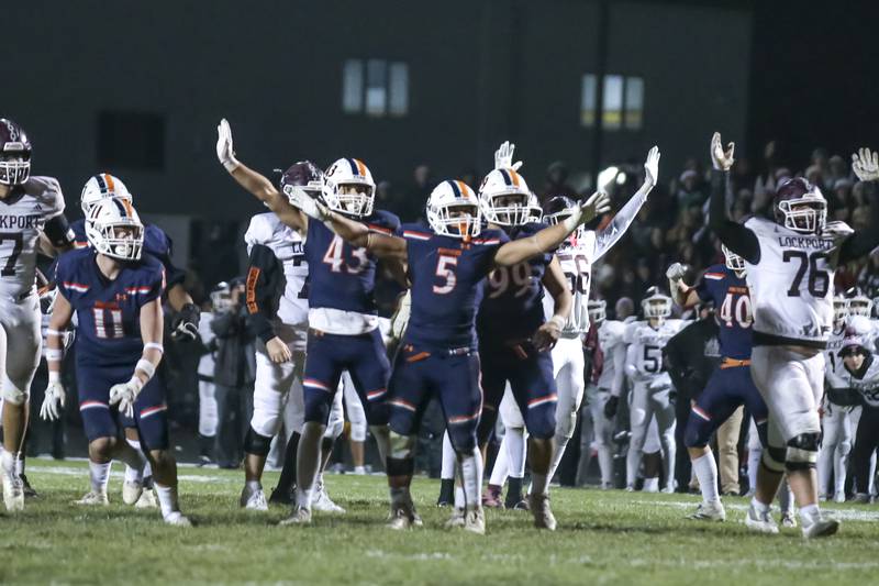 Oswego's Cam Loghmani (5) reacts after Lockport's last second field goal fell short during Class 8A semifinal football game between Lockport at Oswego. Saturday, Nov 22, 2025 in Oswego.