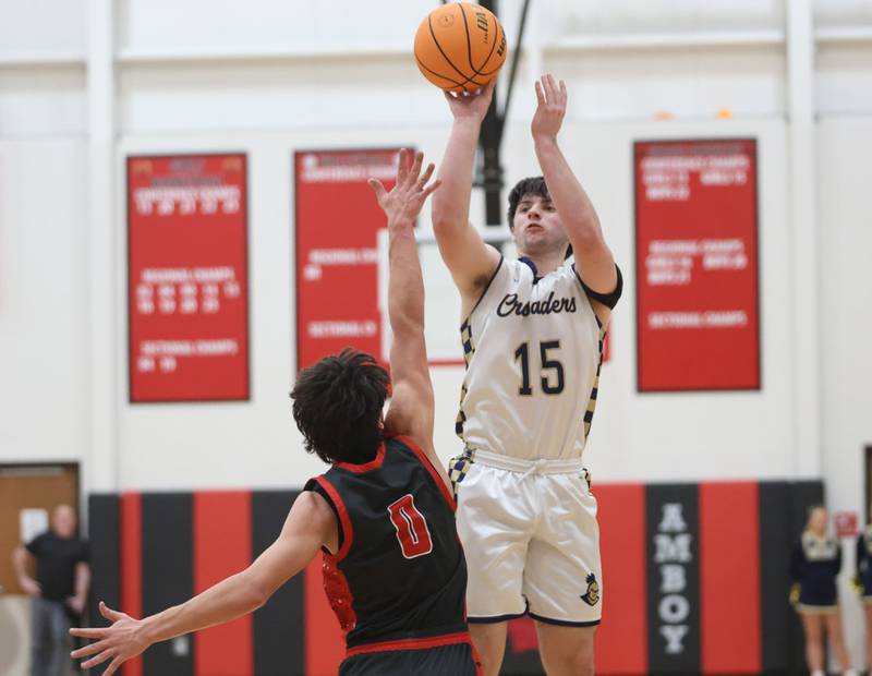 Marquette's Alec Novotney shoots a jump shot over Indian Creek's Cooper Rissman during the Class 1A Sectional game on Friday, March 6, 2026 at Amboy High School.