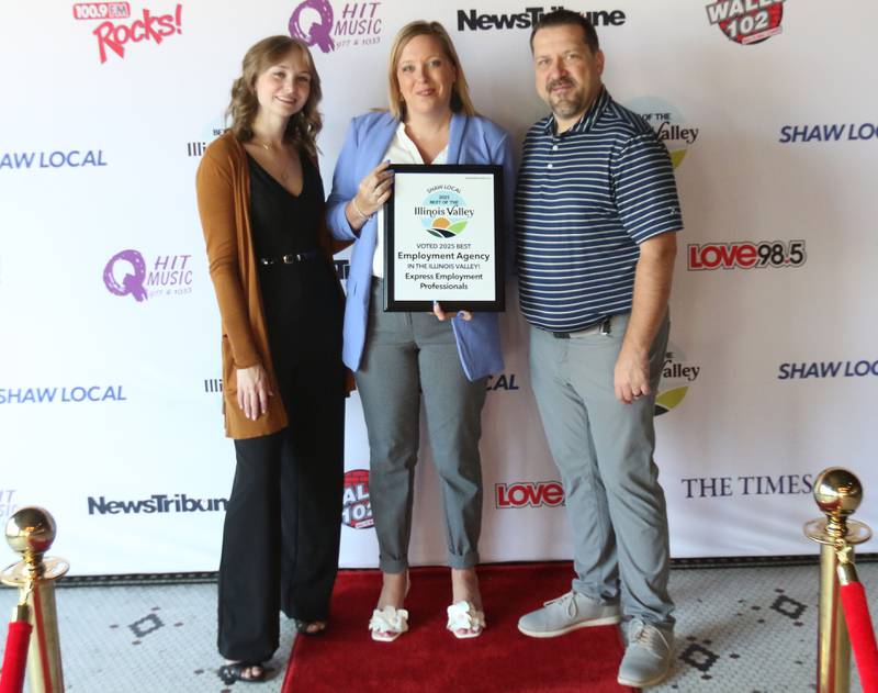 The staff with Express Employement Professionals pose for a photo during the second annual Best of the Illinois Valley event on Thursday at the Auditorium Ballroom in La Salle.