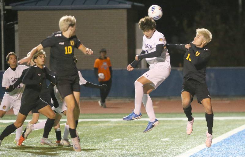 Mendota's Isaac Diaz tries to force the ball into the net as Normal U-High's John Lambert defends during the Class 1A State semifinal game on Thursday, Nov. 7, 2024 at Hoffman Estates High School.