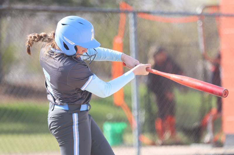 Joliet Catholic’s Lexi Rezzardi connects against Minooka on Tuesday, April 7, 2026 in Minooka.