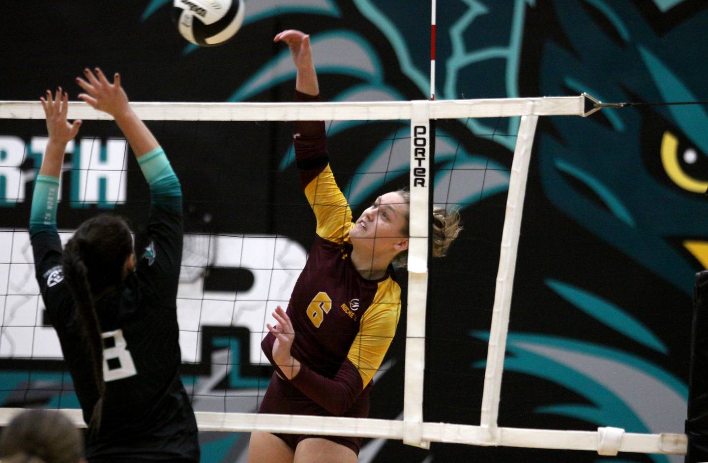 Richmond Burton’s Elissa Furlan hammers the ball over the net in varsity volleyball action at Woodstock North High School in Woodstock on Wednesday, Oct. 16, 2024.