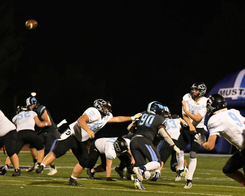 Willowbrook’s Arthur Palicki (1) airs out the ball in the second quarter on Friday Sep. 15, 2023, while traveling to Downers Grove South High school.