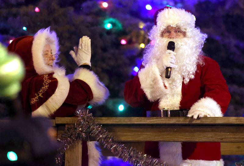 Santa and Mrs. Claus light the Christmas lights on the courthouse lawn Friday, Dec. 6, 2024, during the Sycamore Chamber of Commerce’s Walk With Santa in downtown Sycamore.