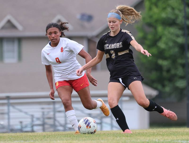 Sycamore's Marin Gautcher and Rock Island's Aubrey Doss go after the ball Friday, May 22, 2026, during their Class 2A regional championship matchup at Sycamore High School.