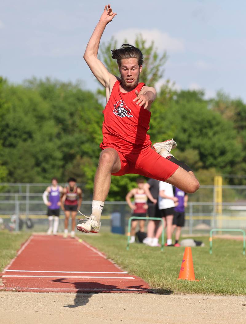 Ottawa’s Dominic Sartori competes in the long jump Tuesday, May 13, 2025, during the Interstate 8 Conference boys track championships at Rochelle High School.