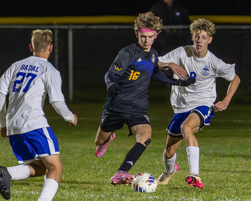 Cole Gudmunson (16) of Somonauk/Leland/Newark pushes Lofton Adkins (8) of Hinckley-Big Rock aside as he dribbles ball during the Little Ten Conference Championship match on Thursday, Oct. 9, 2025 at Hinckley-Big Rock School in Hinckley.