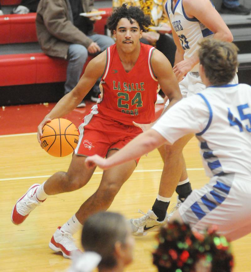 La Salle-Peru's Marion Persich dribbles as Princeton's Luke Smith defends on Friday, Nov. 29, 2024, at Kingman Gym.