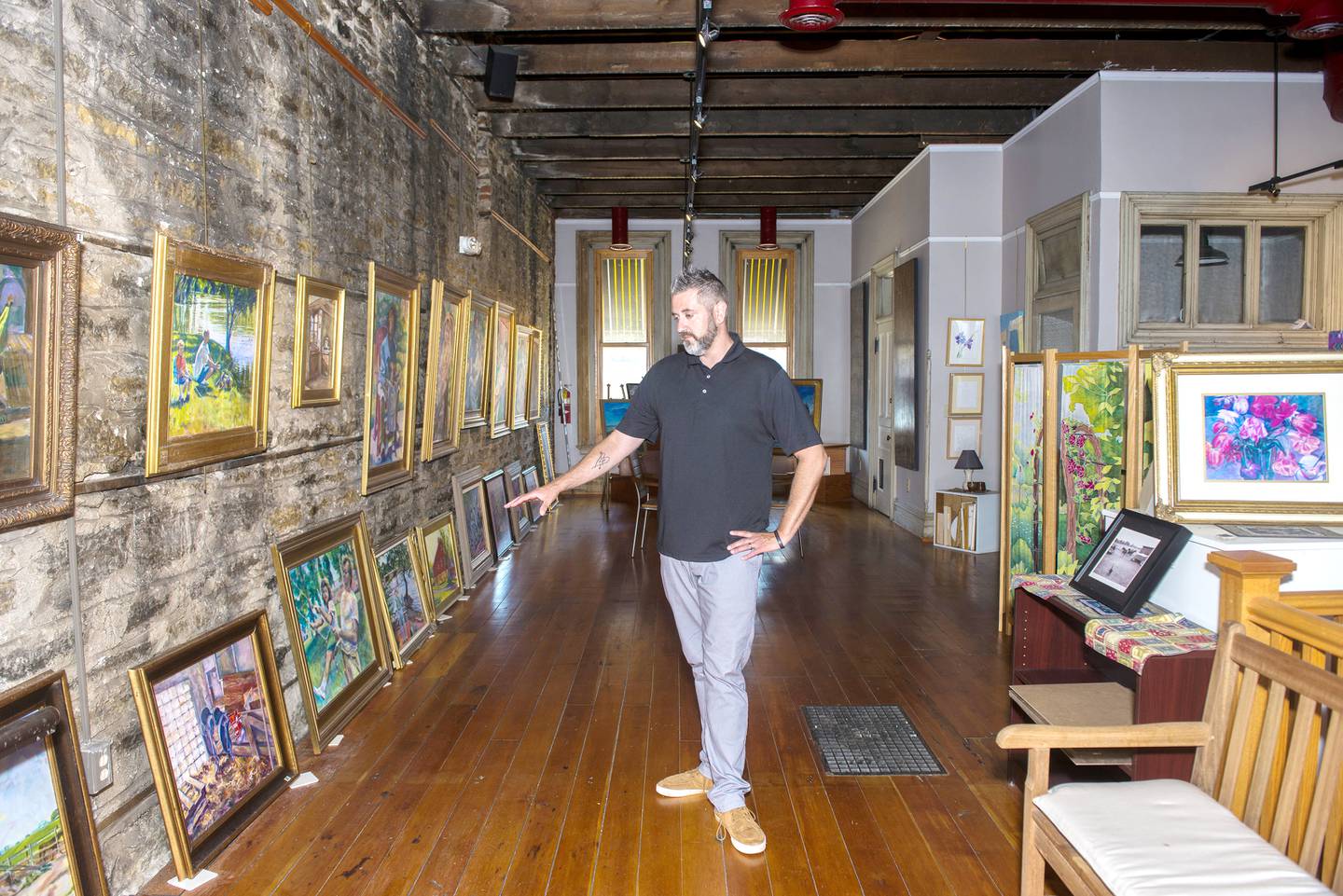 Phil Atilano, new executive director of The Next Picture Show, is turning the unused upstairs in the historic Dixon building into more gallery space.