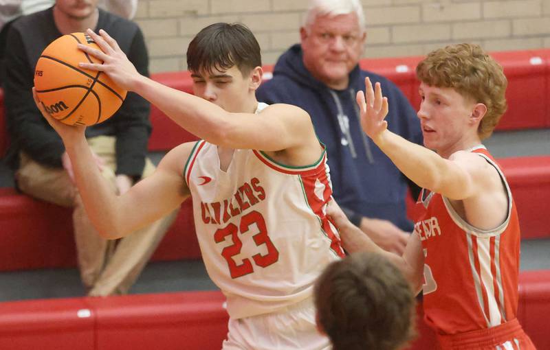 L-P's Jake Hall grabs a rebound over Streator's Jackson Studnicki during the Dean Riley Shootin' The Rock Thanksgiving Tournament on Monday Nov. 24, 2025 in Kingman Gymnasium at Ottawa High School.