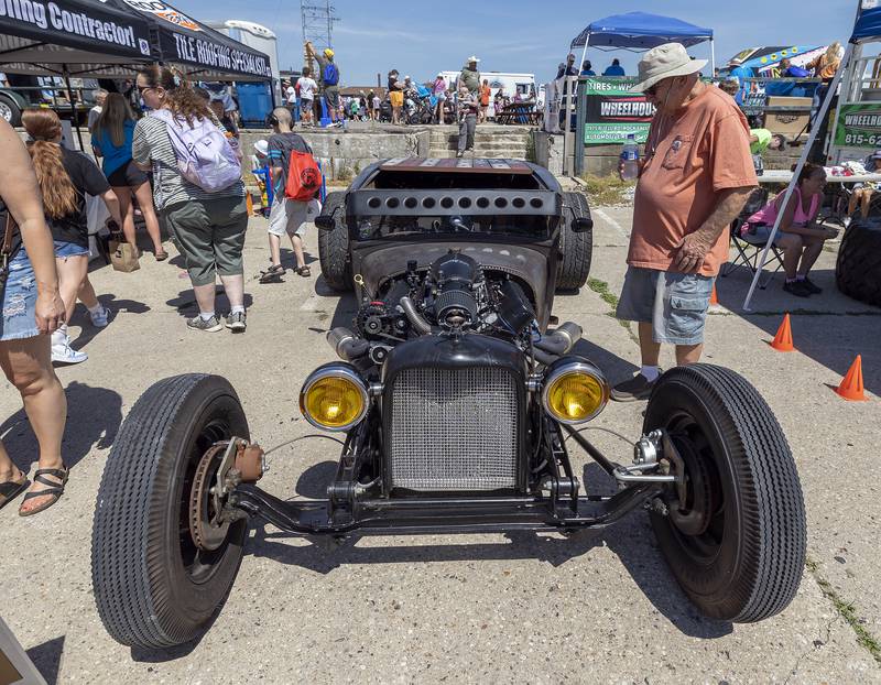 Gerald Baker of Rock Falls checks out a rat rod on display Saturday, June 28, 2025, at the Rock Falls Touch-a-Truck event.