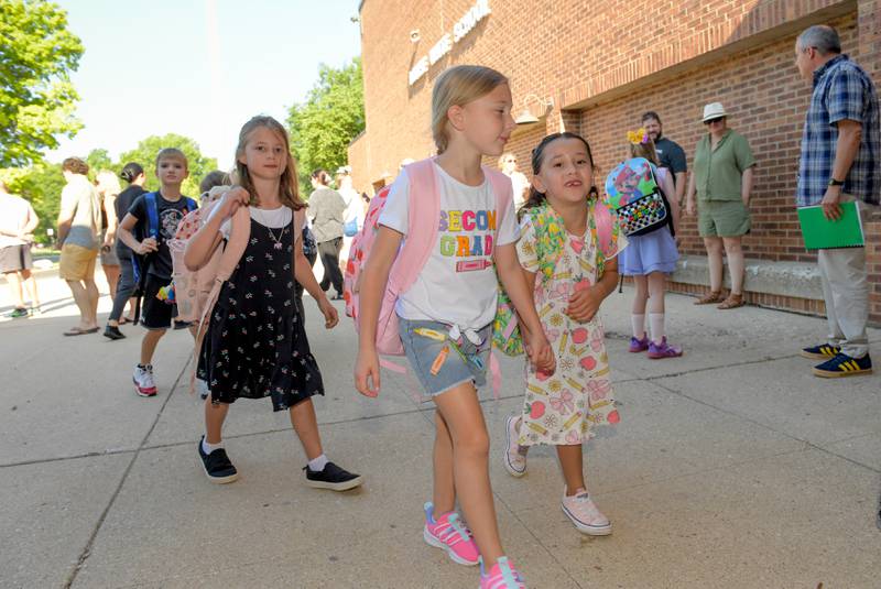 Students arrive at Louise White Elementary School in Batavia for the first day of classes on Wednesday, Aug 14, 2025.
