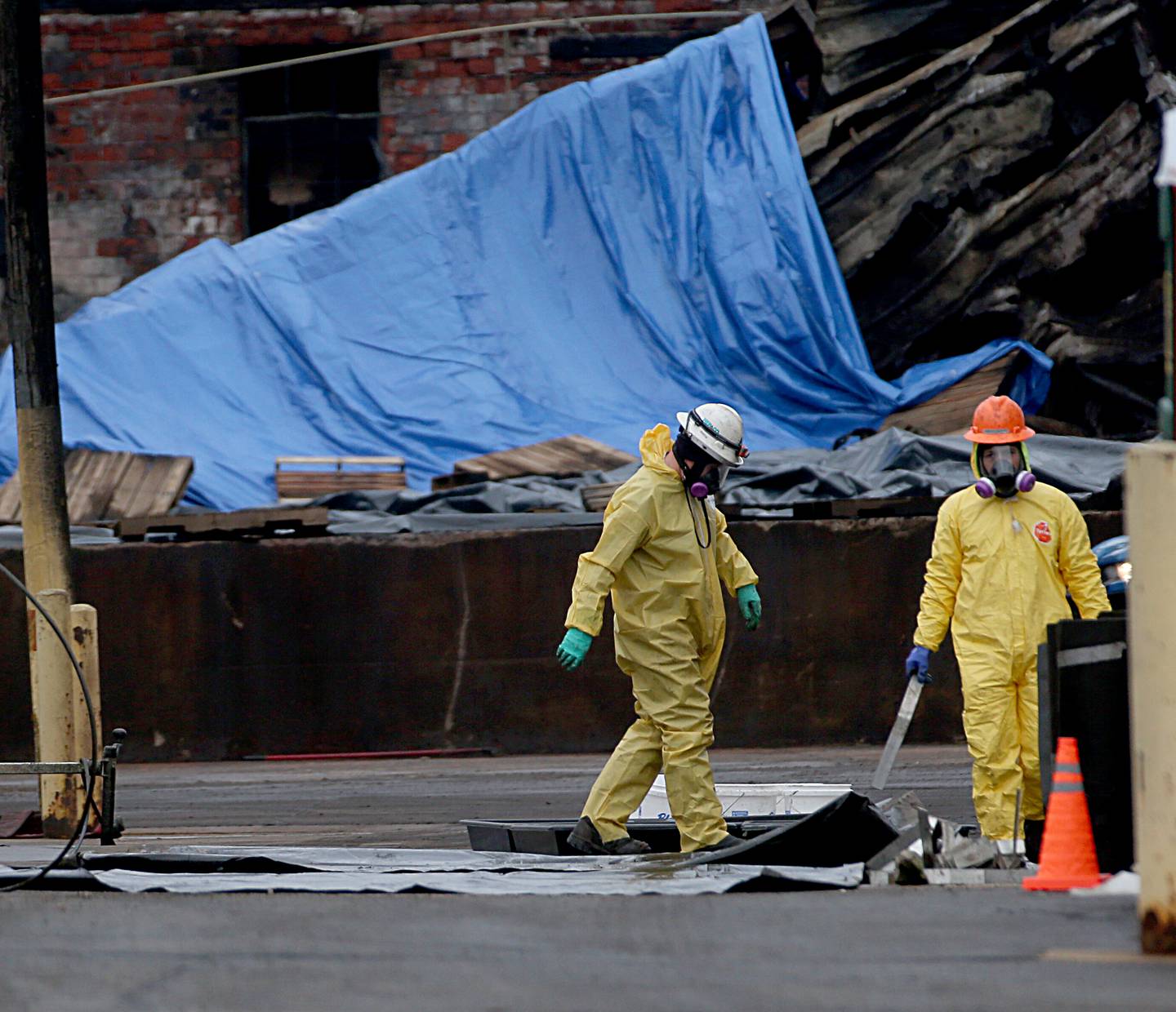 A hazmat team cleans up chemicals at Carus Chemical on Tuesday, Jan. 17, 2023 in La Salle.