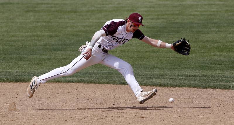 Richmon-Burton’s Connor Wallace tries to fields the ball during a IHSA Class 2A supersectional baseball game between Richmond-Burton and Timothy Christian at the Rockford Rivets Stadium in Rockford.