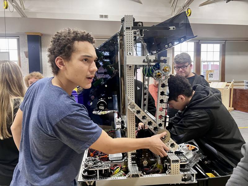 Sterling High School robotics team designer Gewelious Jenkins explains the design process Wednesday, March 5, 2025, at Sterling High School.