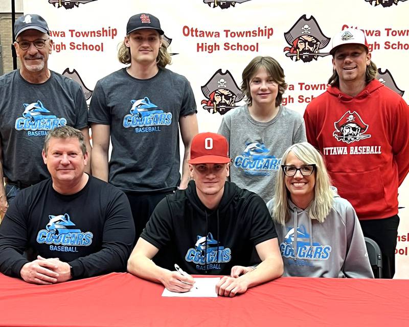 Ottawa’s Tate Wesbecker has signed to continue his education at Kalamazoo Valley Community College in Kalamazoo, Michigan, and his baseball career at the NJCAA level with the Cougars. Wesbecker, a pitcher and first-team member of the 2024 Times All-Area Baseball Team, is pictured at his signing ceremony surrounded by family and former Ottawa baseball coach Tyler Wargo (standing at far right).